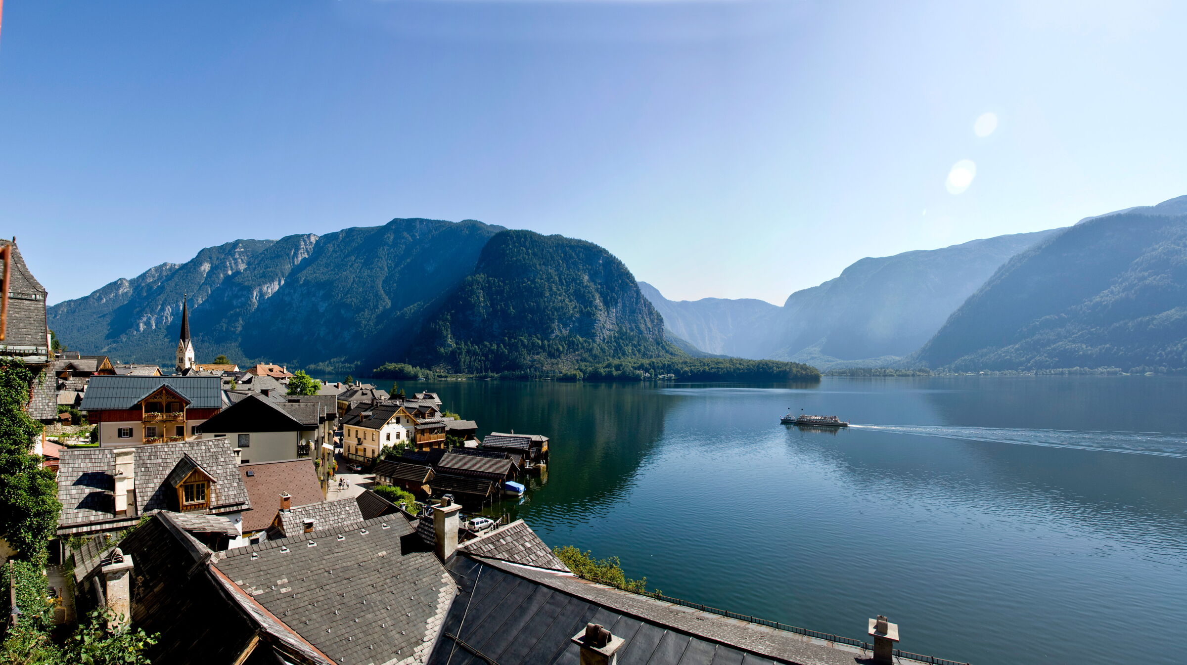 View over the rooftops of Hallstatt with a wonderful view of Lake Hallstatt and the surrounding mountain landscape of the Salzkammergut